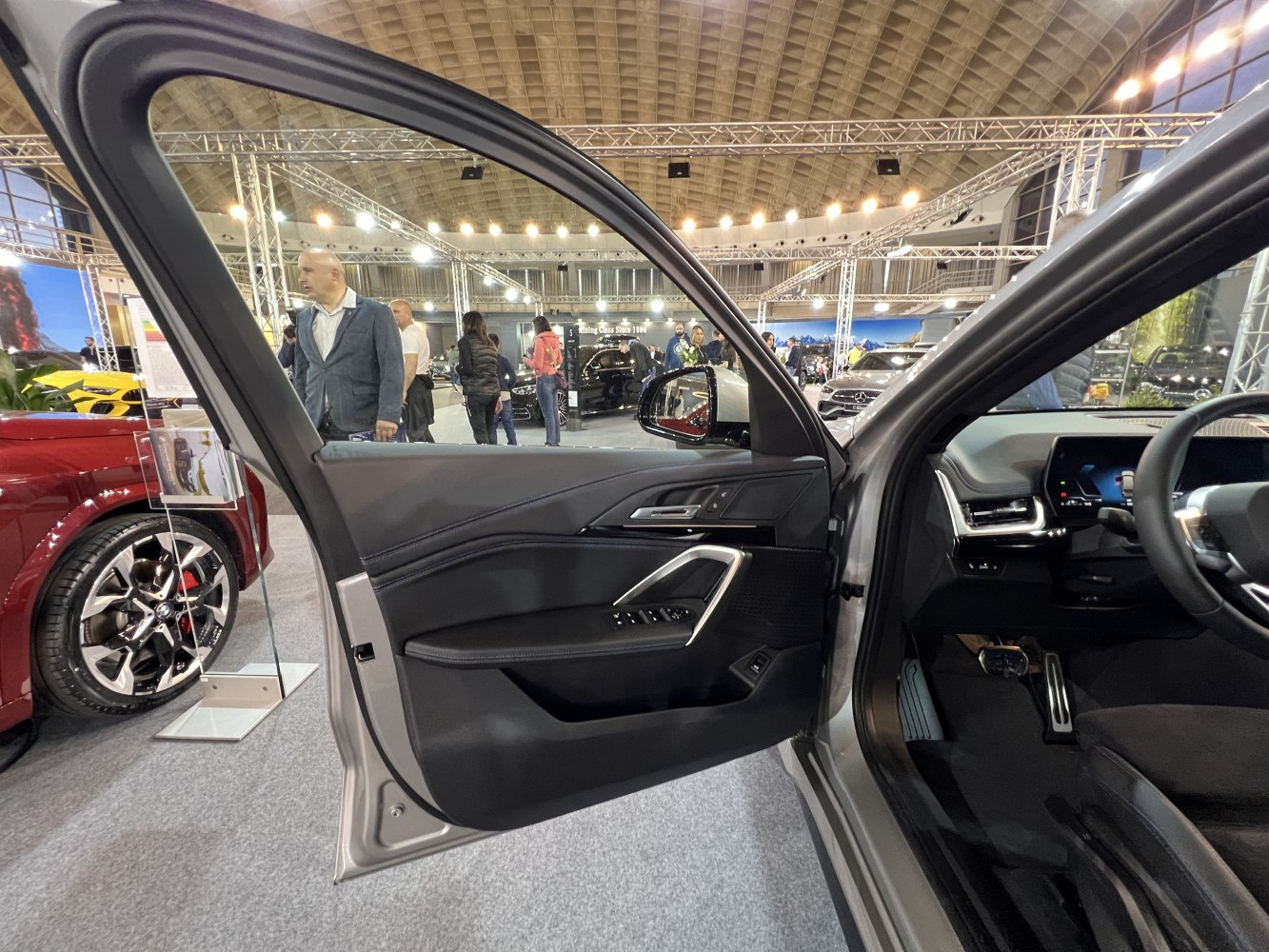 Interior door panel and dashboard view of the front driver side