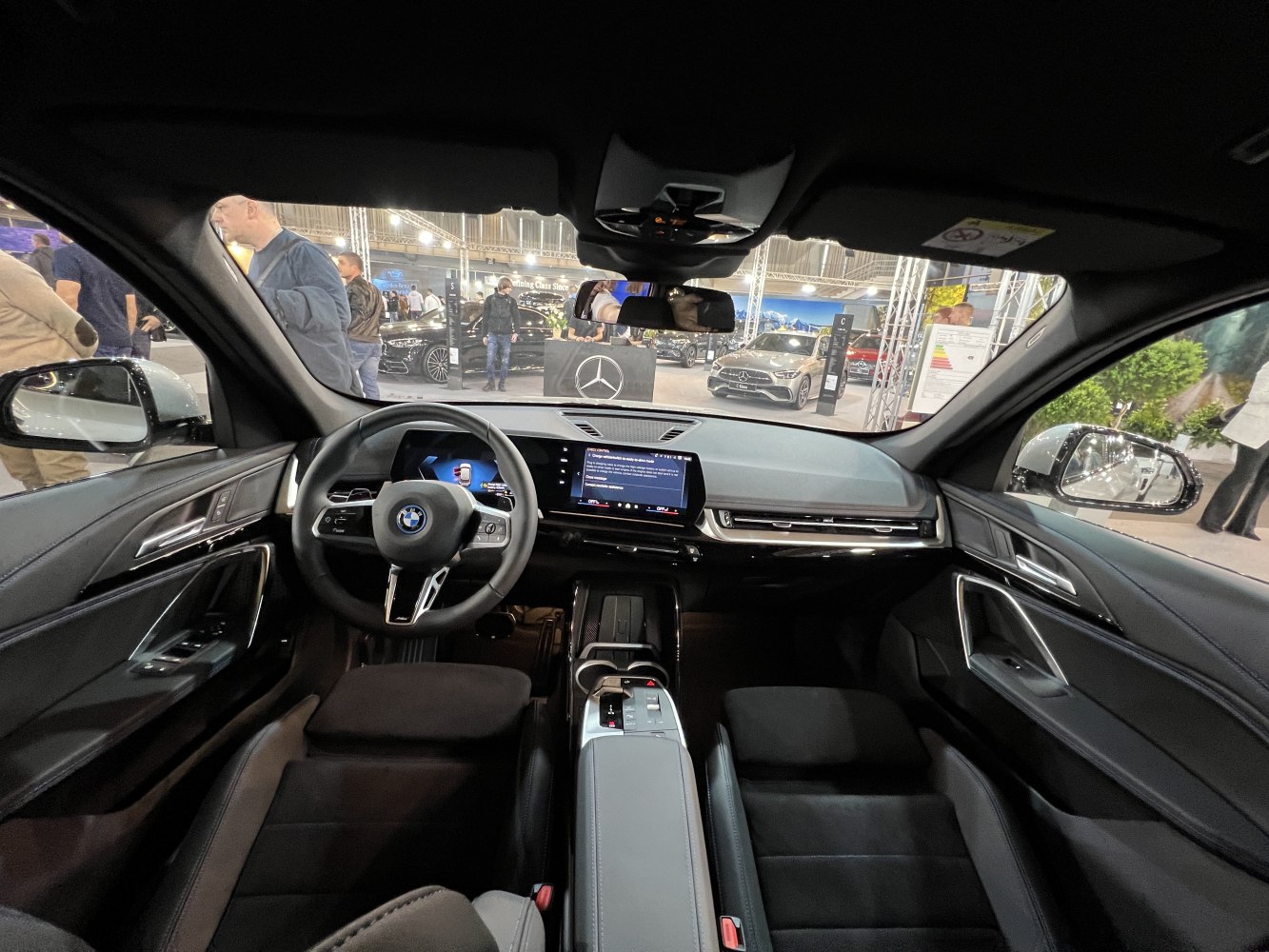 Digital dashboard and infotainment screen with ergonomic steering wheel