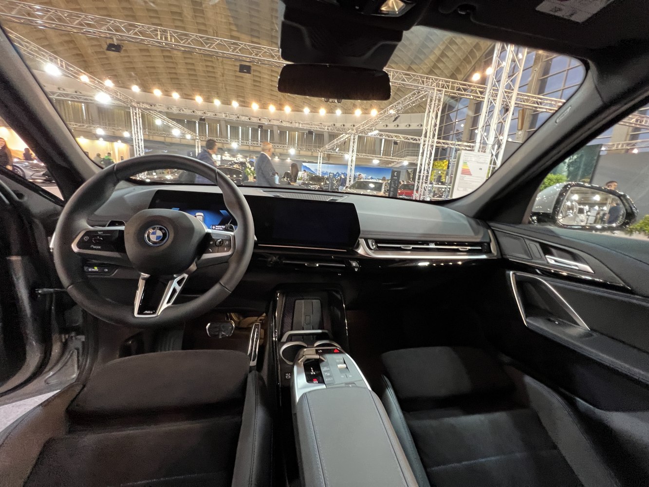 Modern dashboard and steering wheel with digital displays and center console