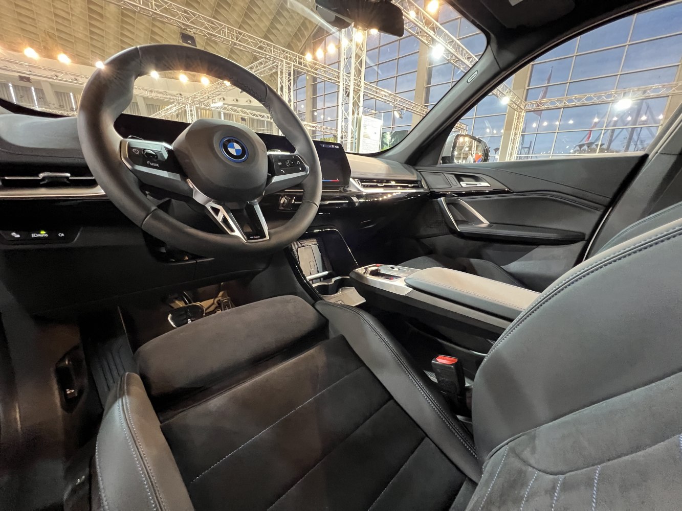 Modern BMW interior with multifunction steering wheel and premium cabin design