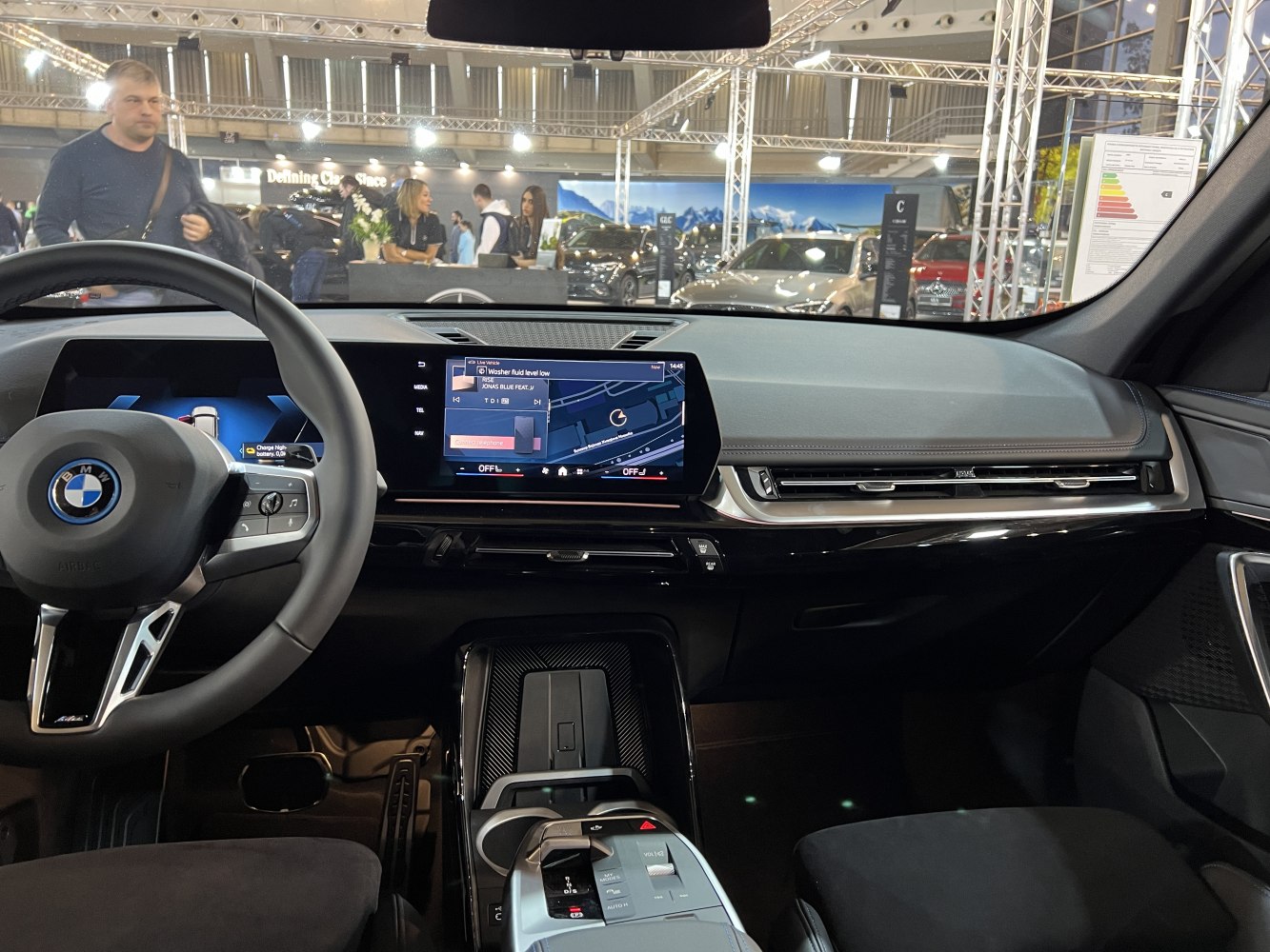 Digital dashboard with touchscreen infotainment and modern steering wheel