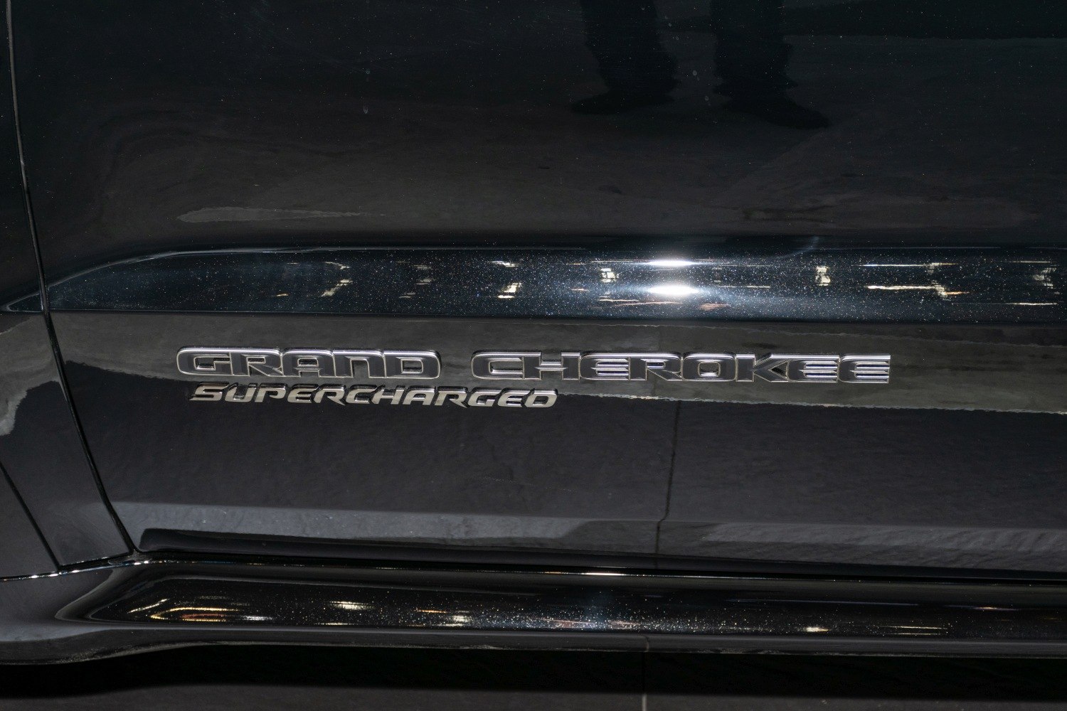 Close-up of Grand Cherokee Supercharged side emblem