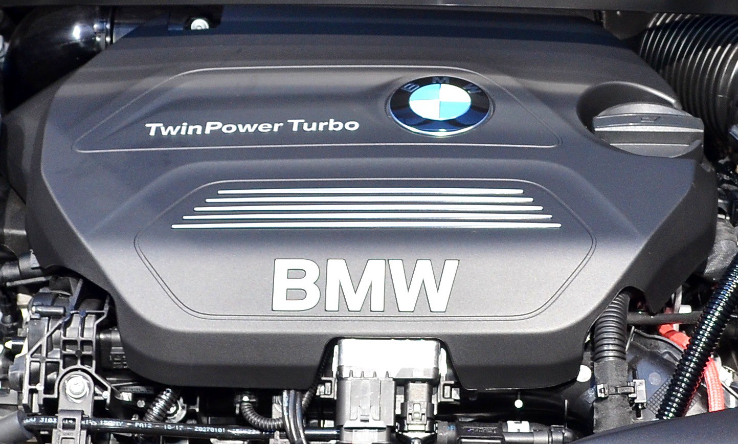 TwinPower Turbo engine cover with BMW logo and engine components