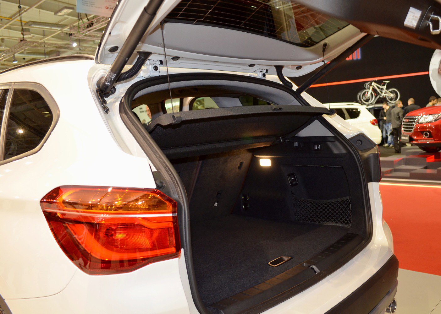 Open trunk space with rear tail light and cargo cover