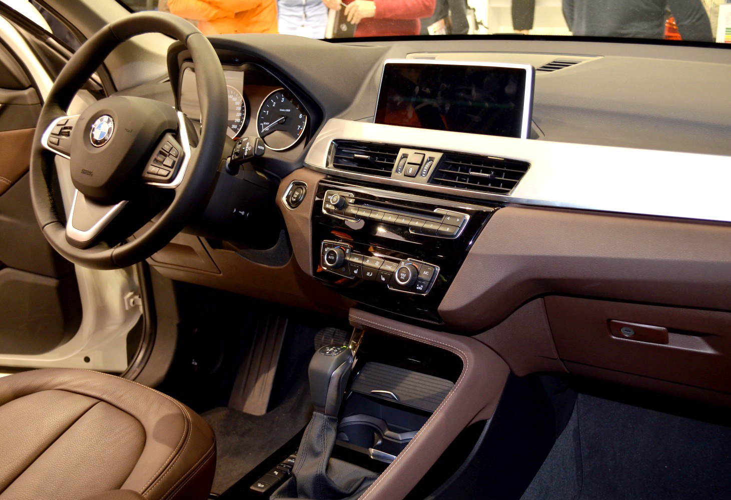 Modern dashboard with multimedia display and multifunction steering wheel