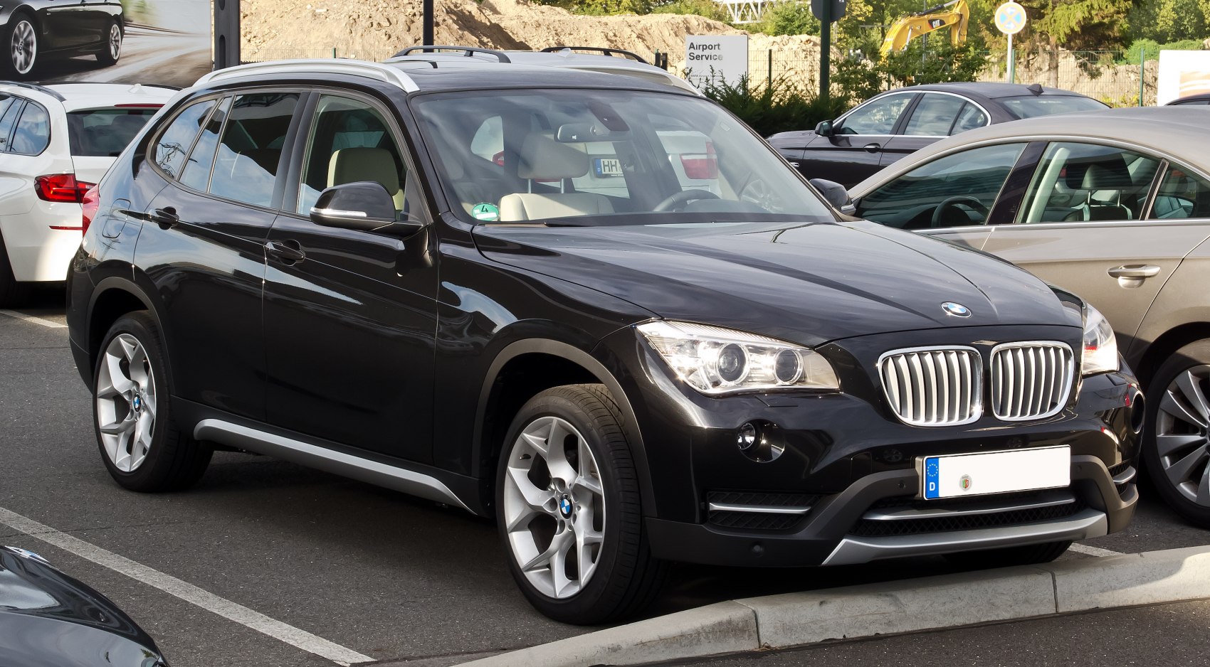 Front and side view with kidney grille and alloy wheels