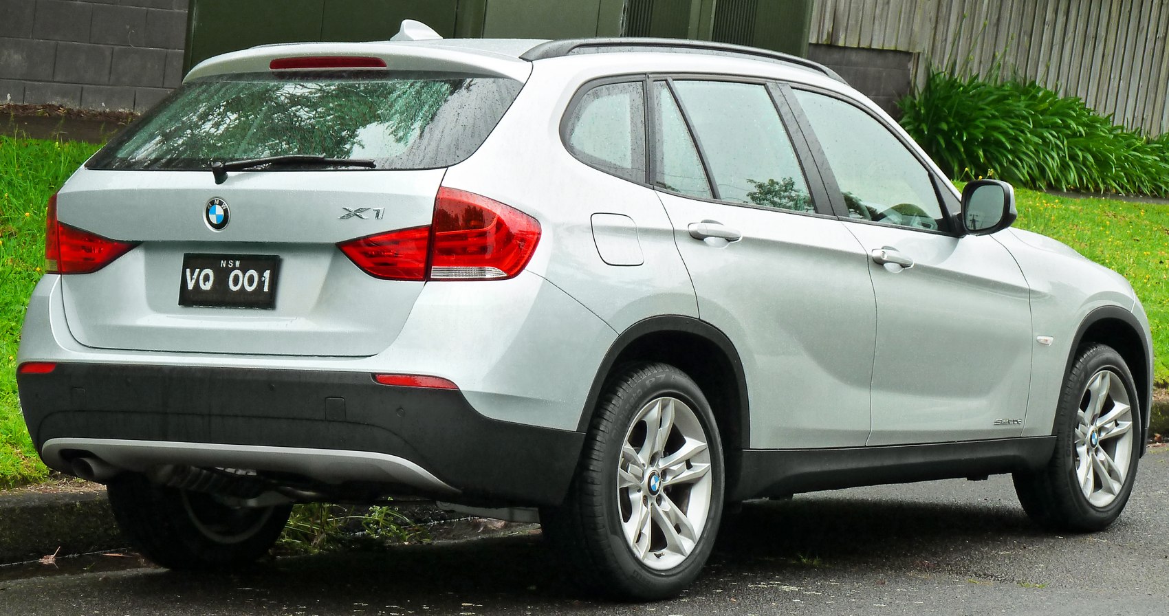 Silver SUV rear and side profile with tail lights and alloy wheels