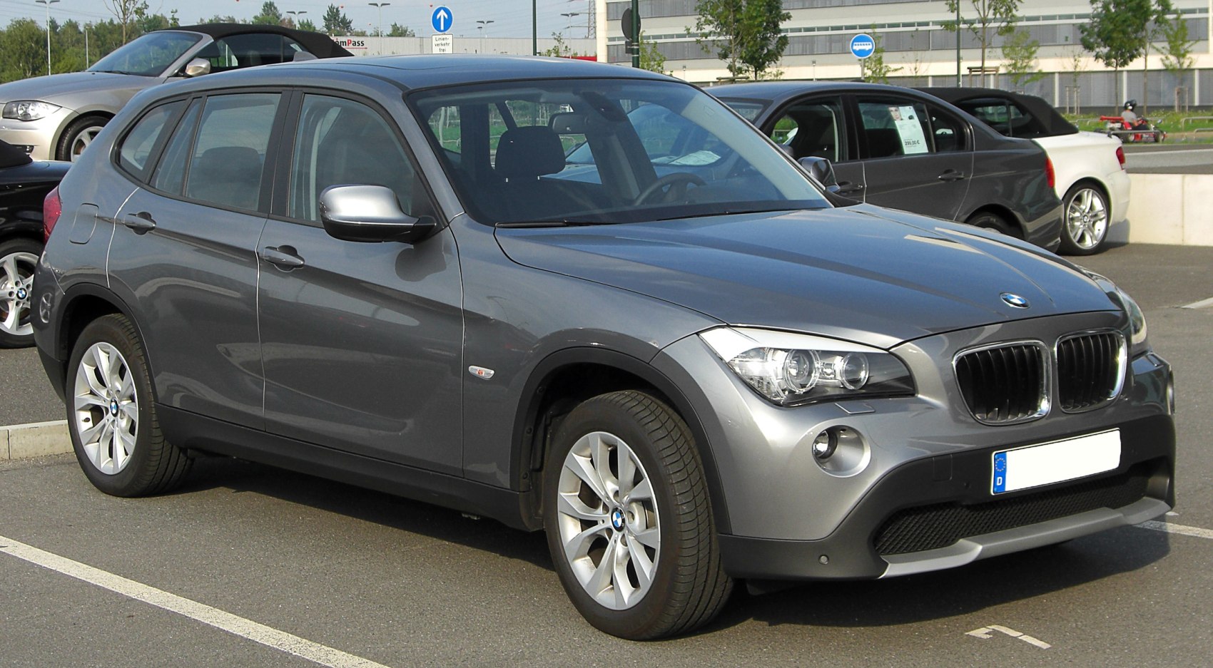 Silver compact SUV with kidney grille and modern headlights