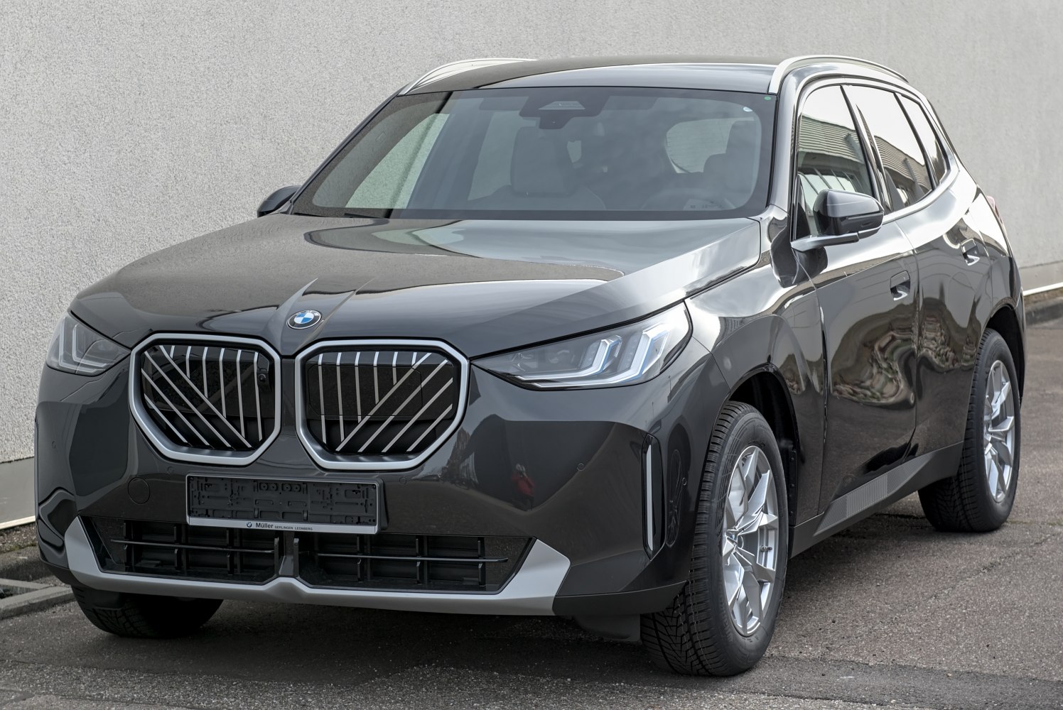 Front view with iconic kidney grille and sleek headlights
