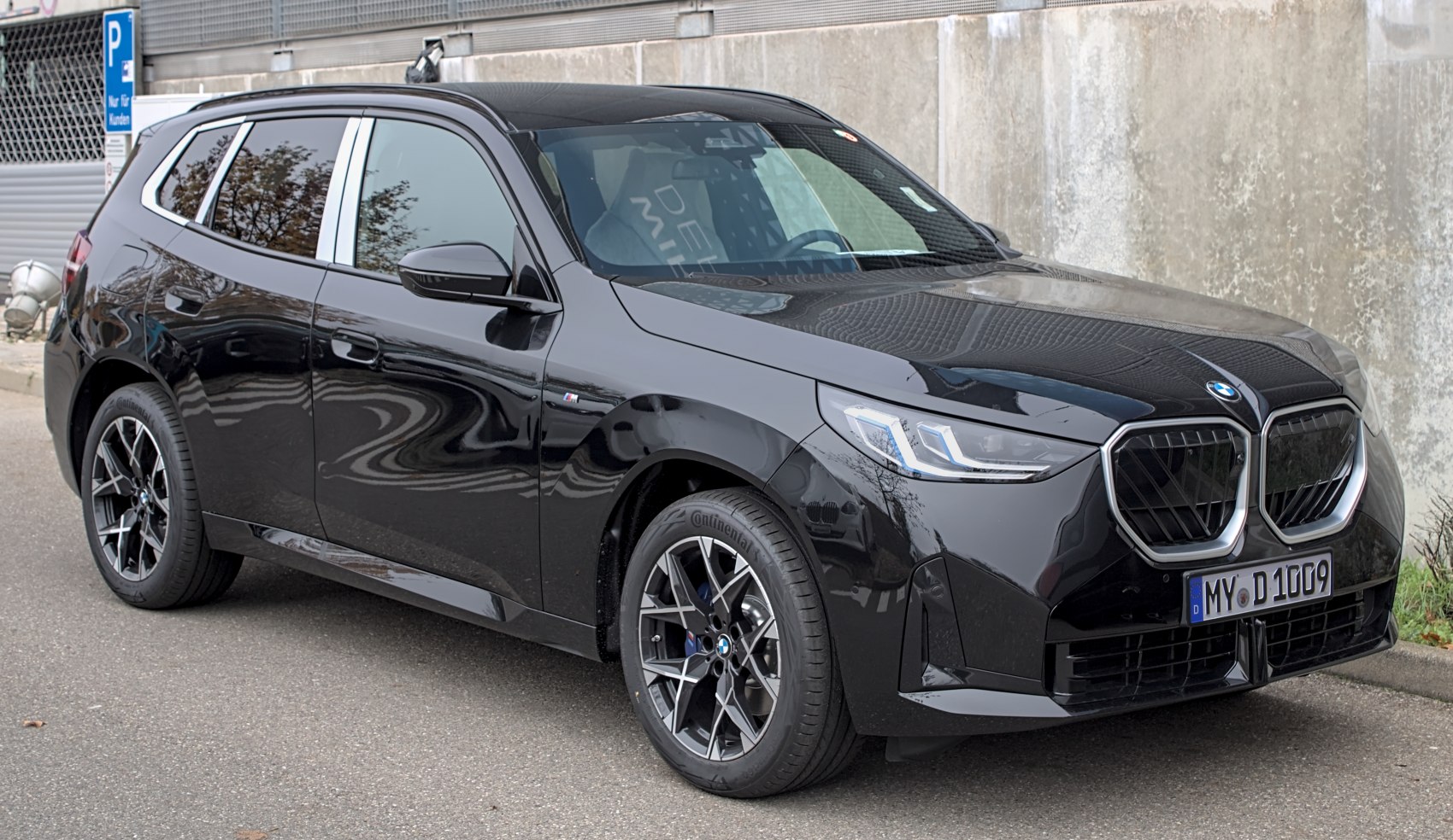 Black SUV front and side profile with LED headlights and kidney grille