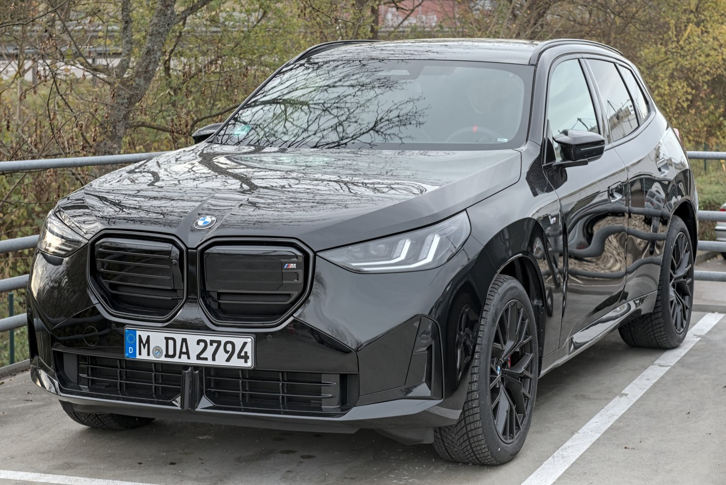 Electric SUV with distinct kidney grille and LED headlights