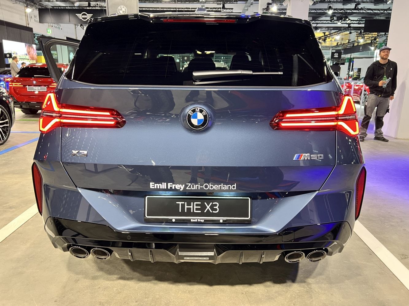 Rear view with LED tail lights and quad exhaust pipes