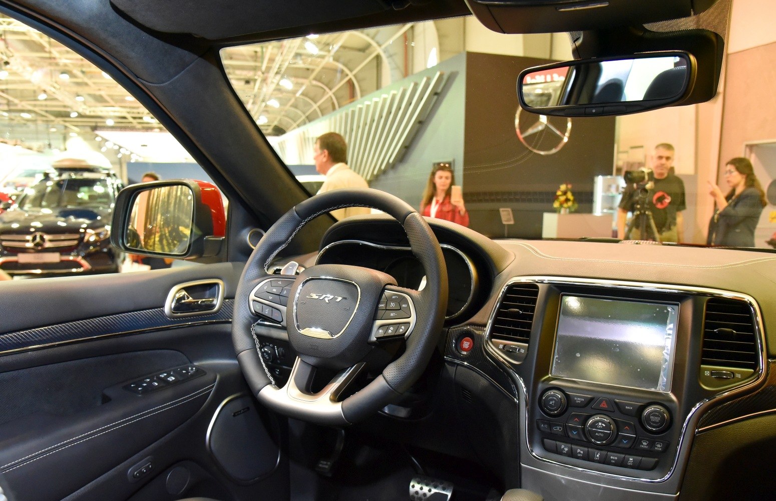 SRT steering wheel and touchscreen display in SUV interior
