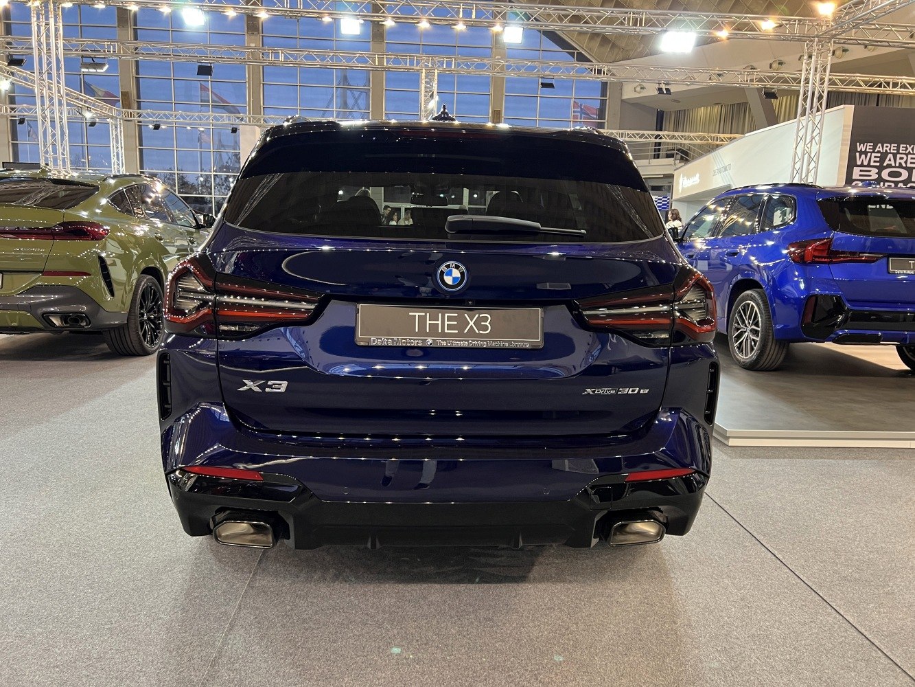 Rear view of SUV with dual exhausts and distinctive tail light design