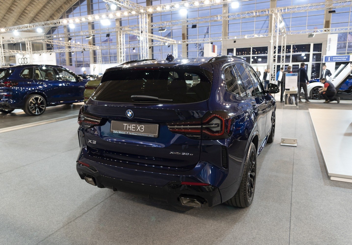 Rear view with distinct tail lights and dual exhaust features