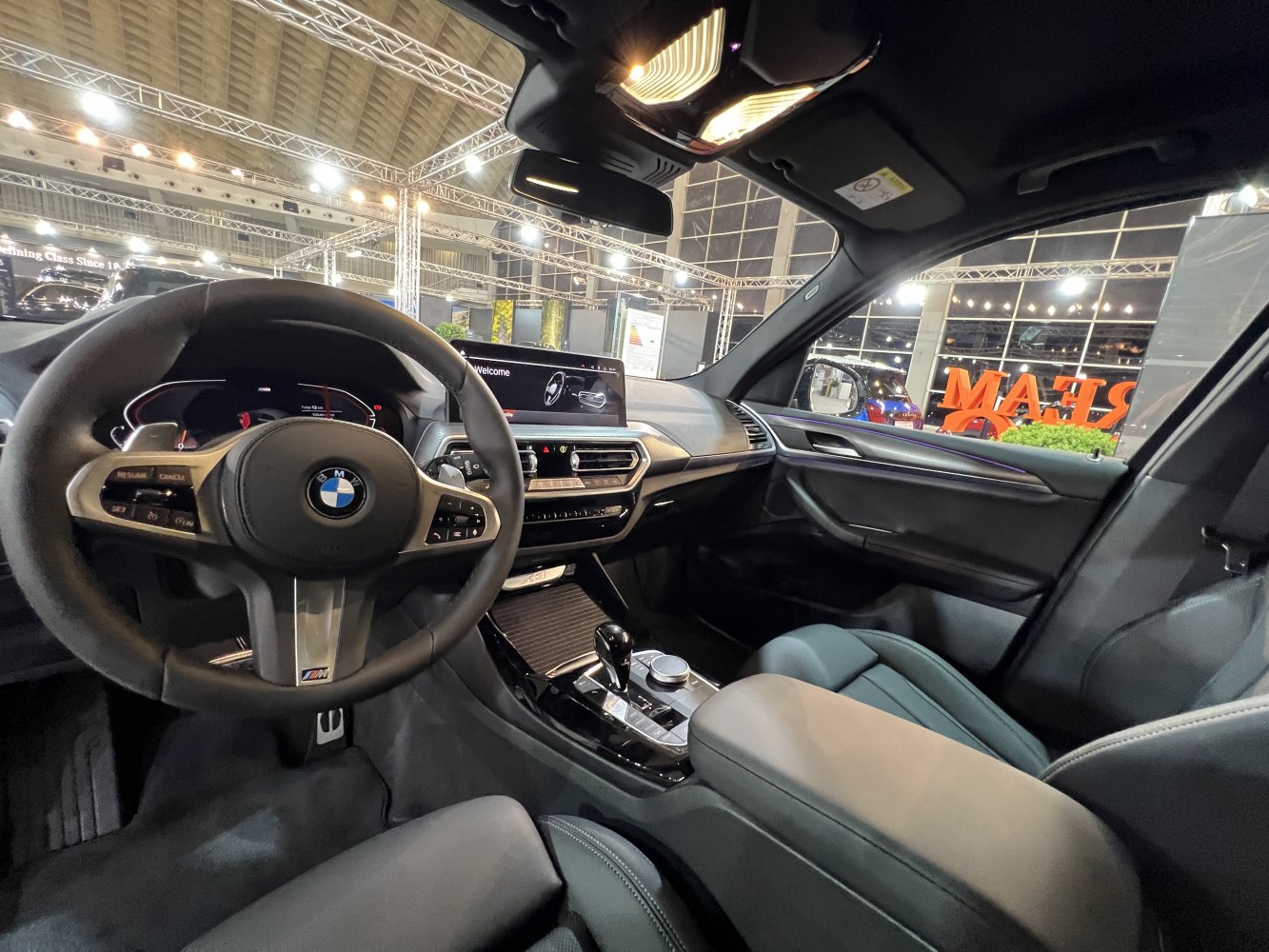 Modern dashboard and steering wheel with digital display and center console