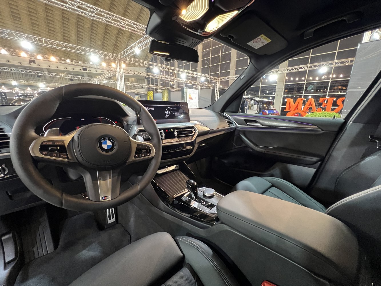 Steering wheel, dashboard, and center console of a modern SUV interior