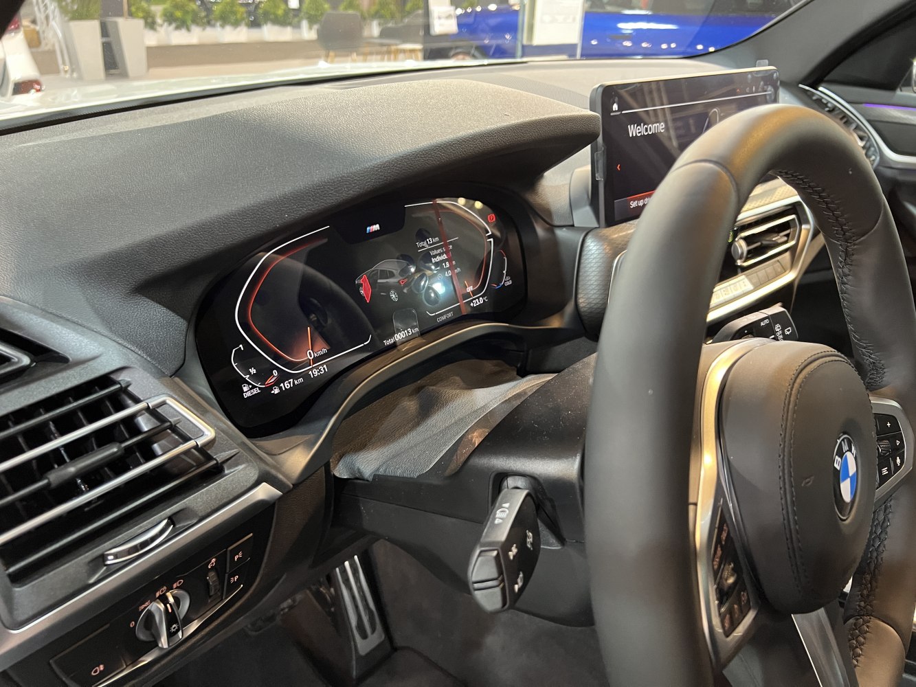 Digital dashboard and steering wheel interior with modern controls