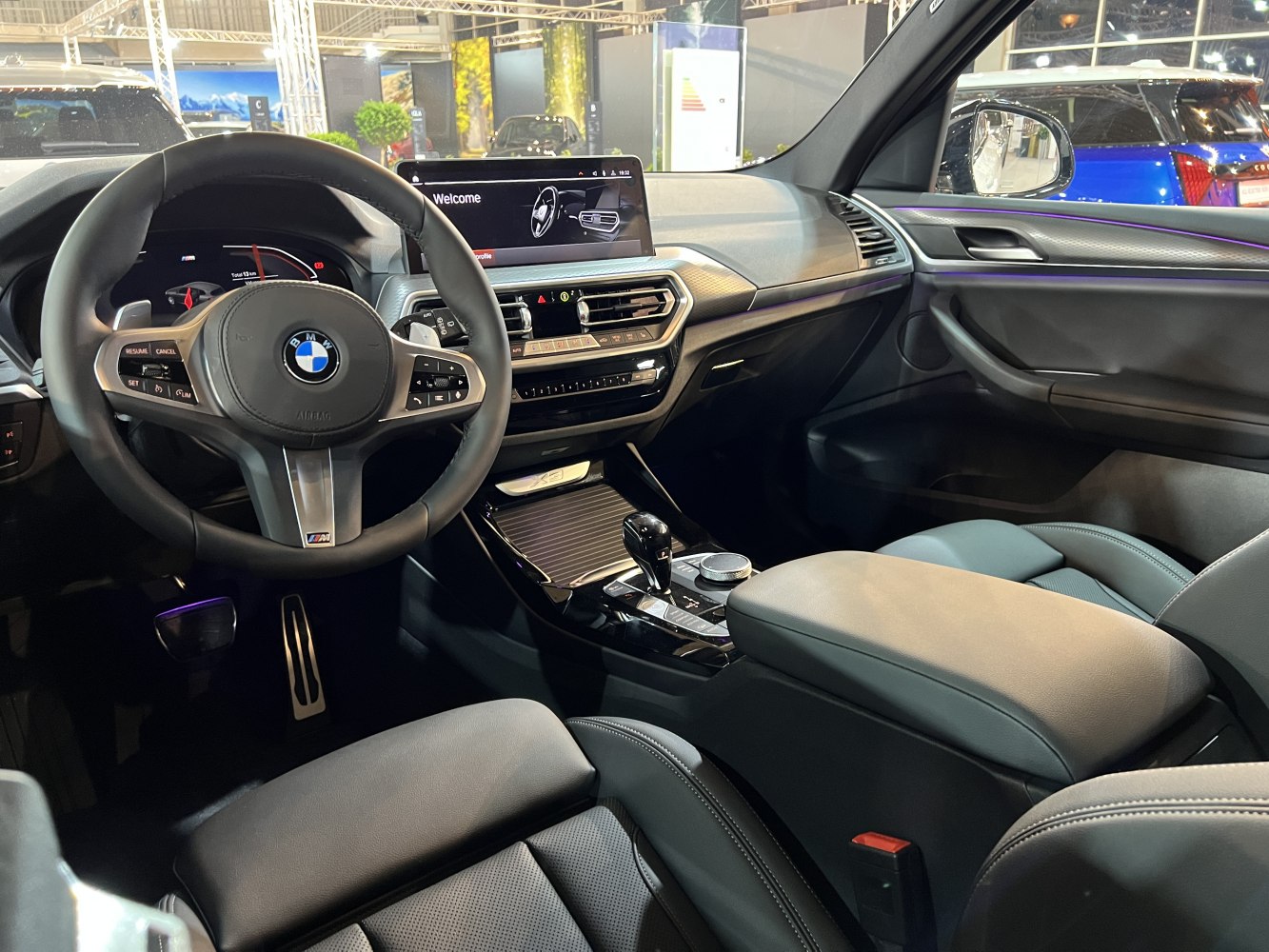 Modern SUV interior with digital dashboard and multifunction steering wheel