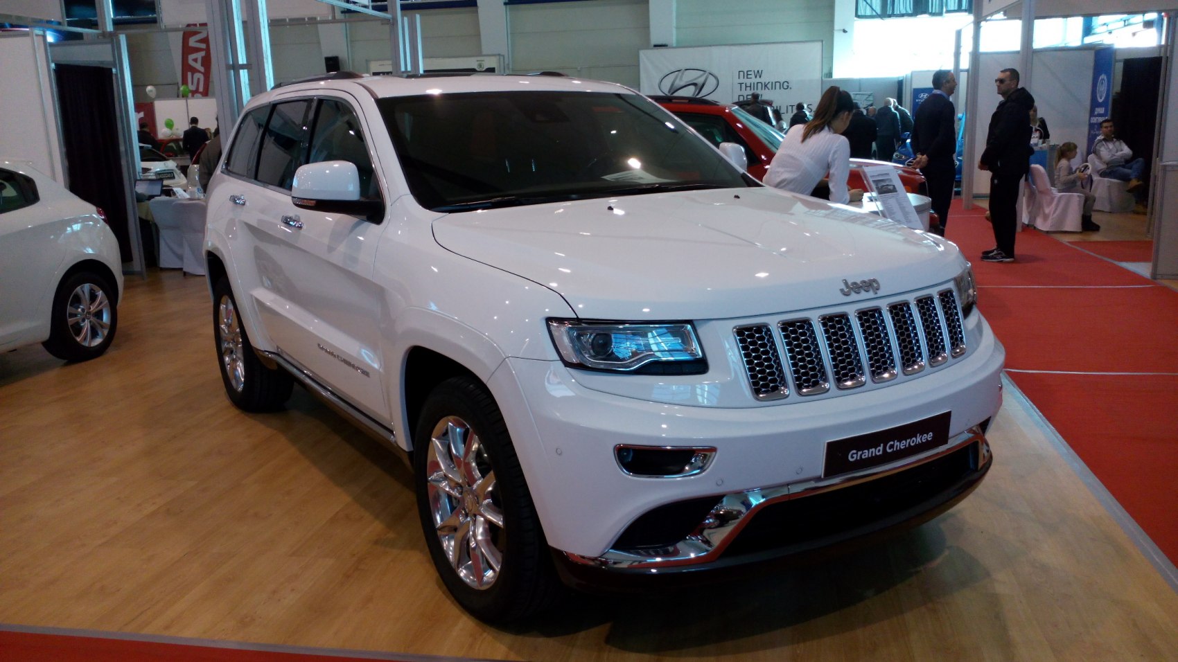 White SUV with chrome grille and LED headlights