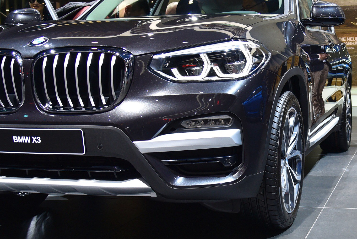 BMW X3 front kidney grille and LED headlights close-up