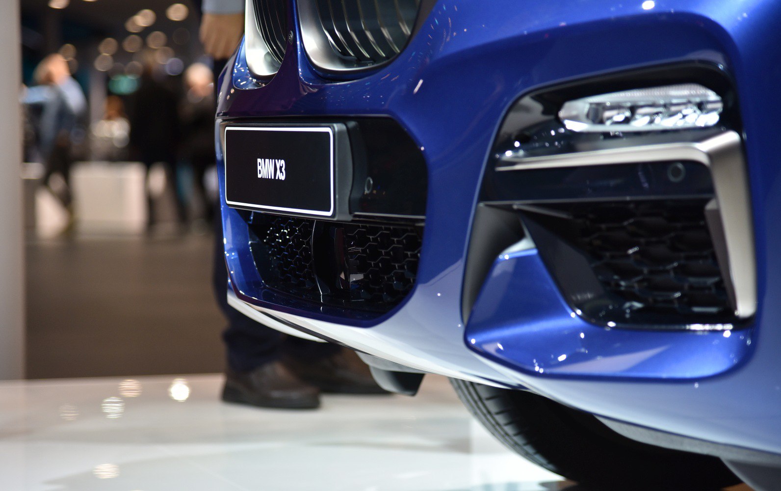 Front bumper, grille, and LED light cluster close-up