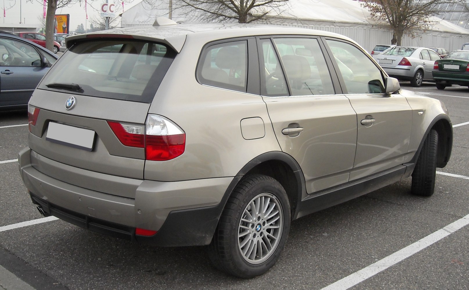 Rear quarter view of SUV with alloy wheels and distinct tail lights
