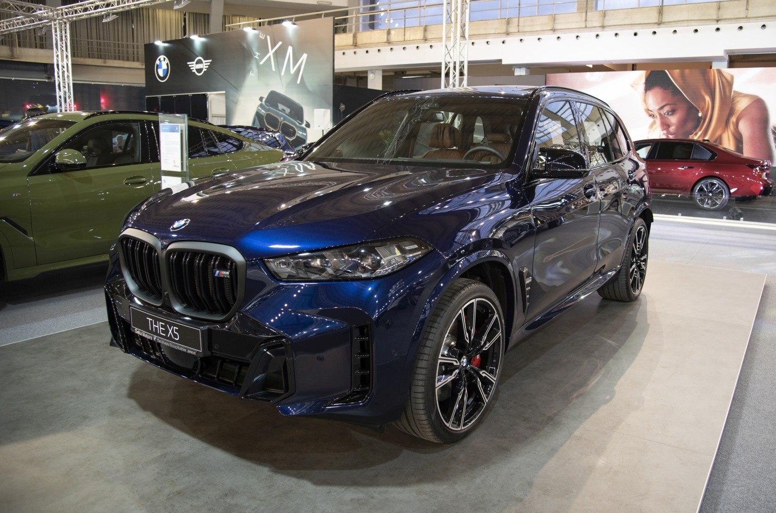 SUV front view with kidney grille and sporty alloy wheels