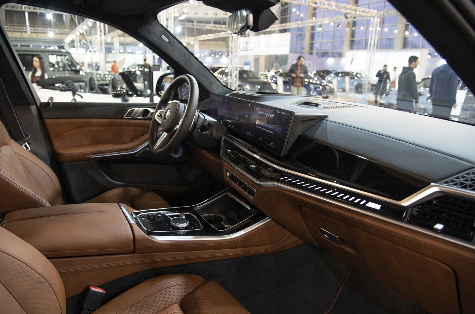 Luxury interior with digital dashboard and brown leather seats