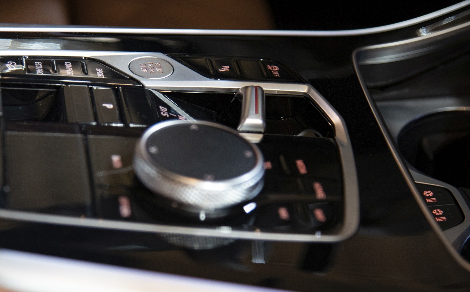 Close-up of modern central control panel and gear selector knob