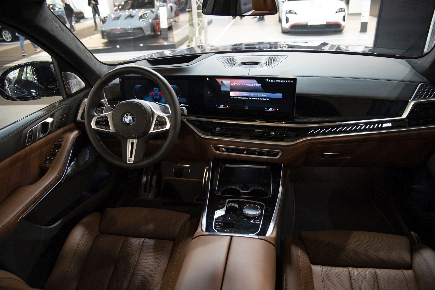 Digital dashboard and brown leather interior with advanced controls