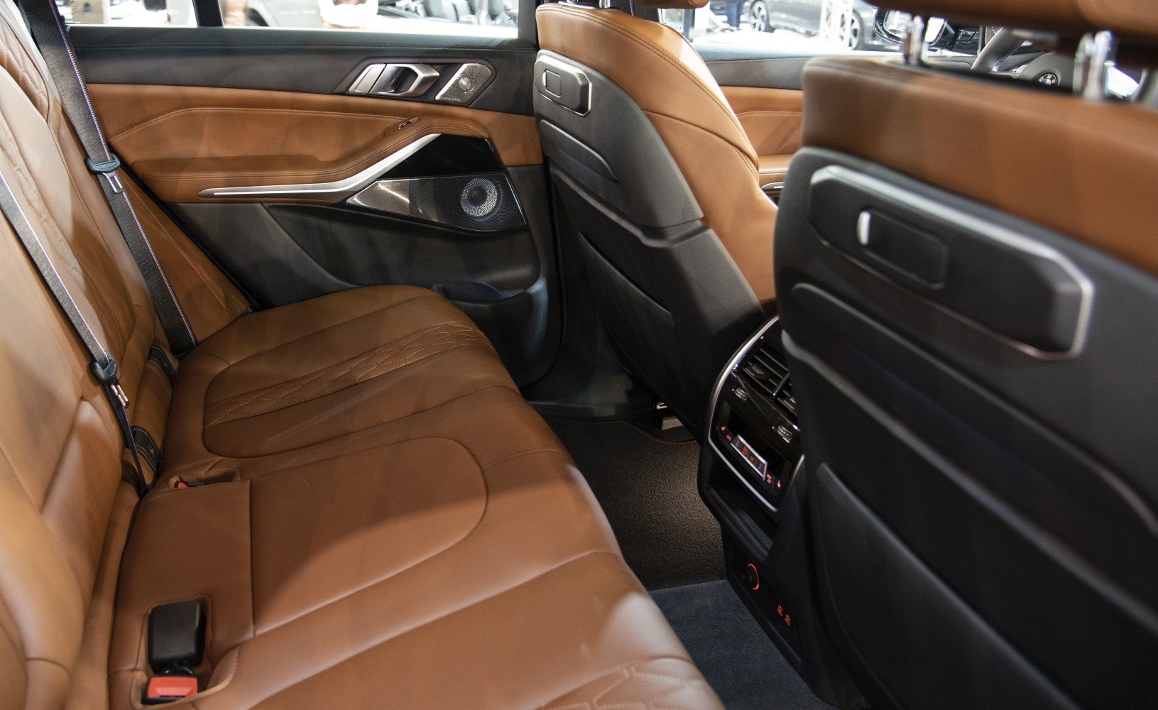 Brown leather rear seats with premium speaker and rear climate controls