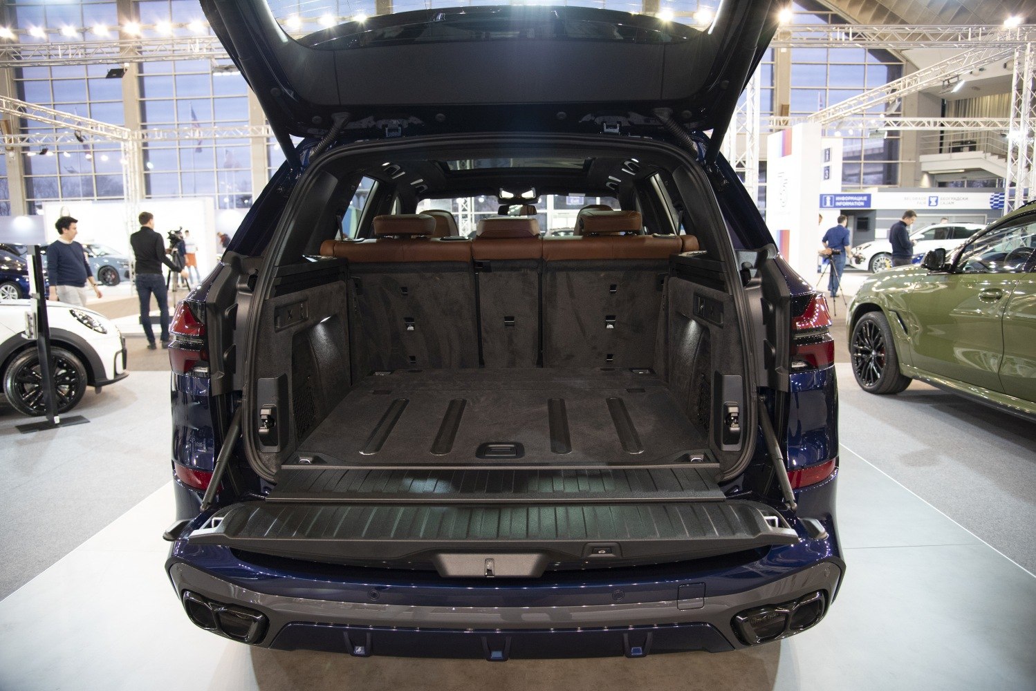 Spacious trunk and open rear hatch of convertible sports car