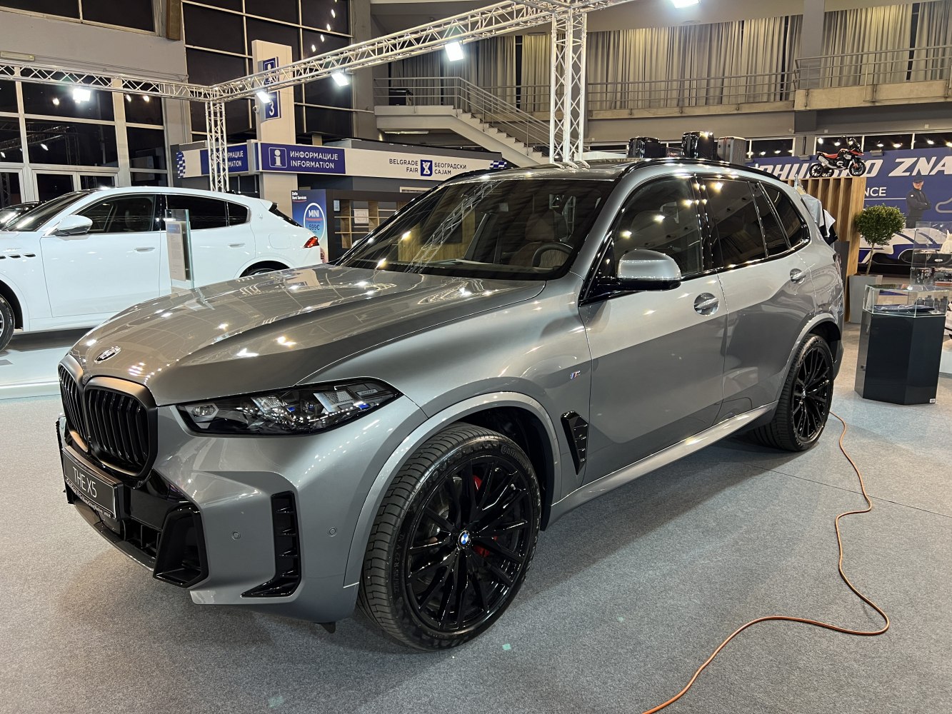 Metallic gray SUV with black kidney grille and black alloy wheels
