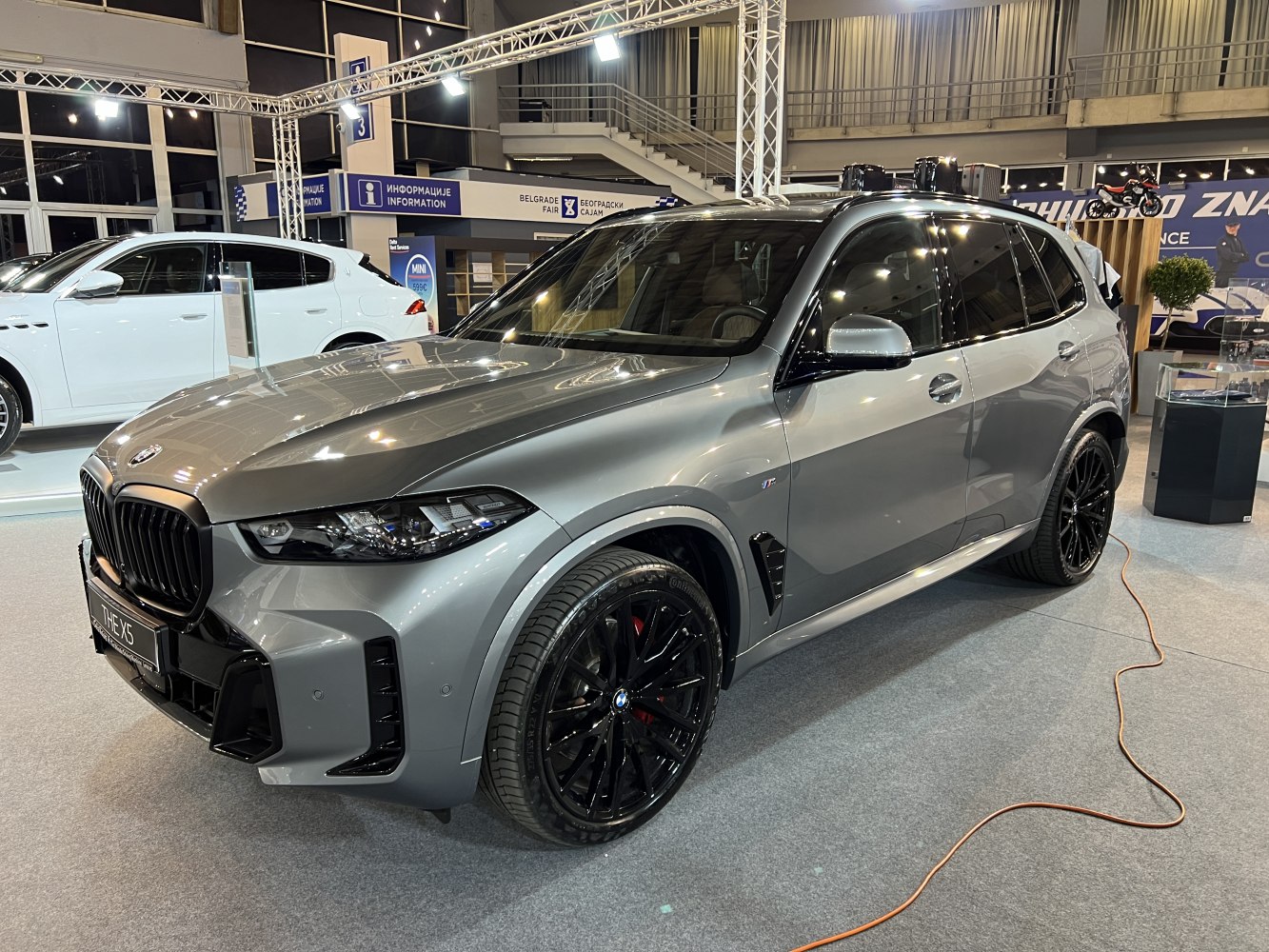 Sporty front fascia and large black alloy wheels on SUV