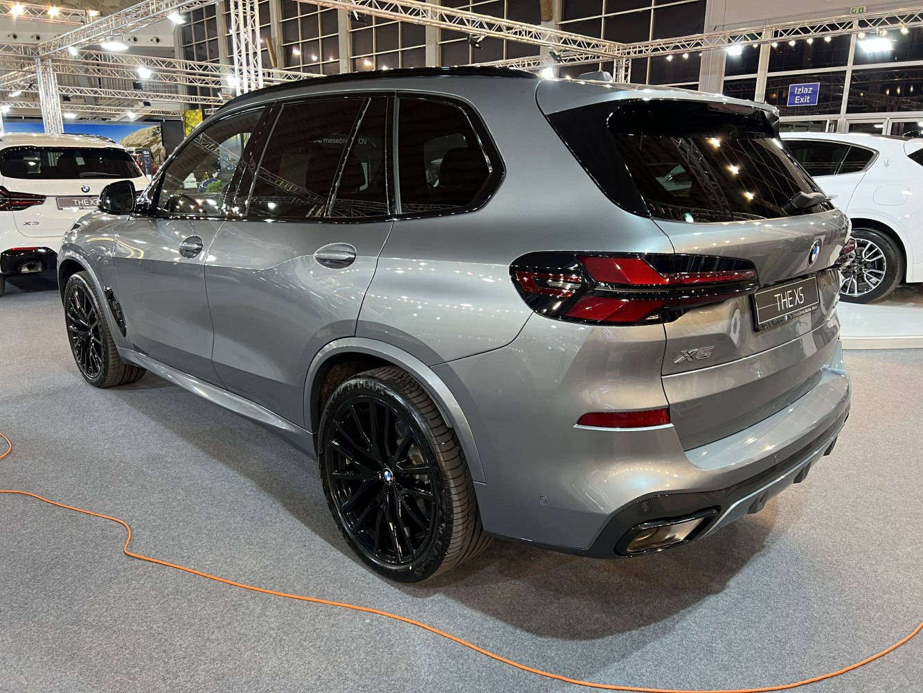 Rear and side view of SUV with sleek taillights and black wheels