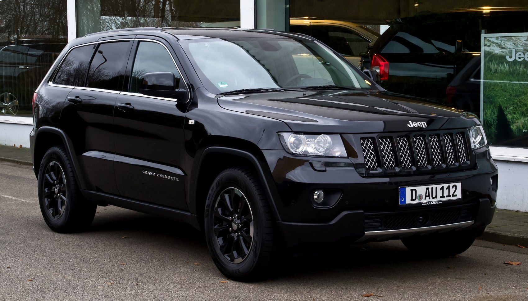 Black SUV with front side view and distinctive grille