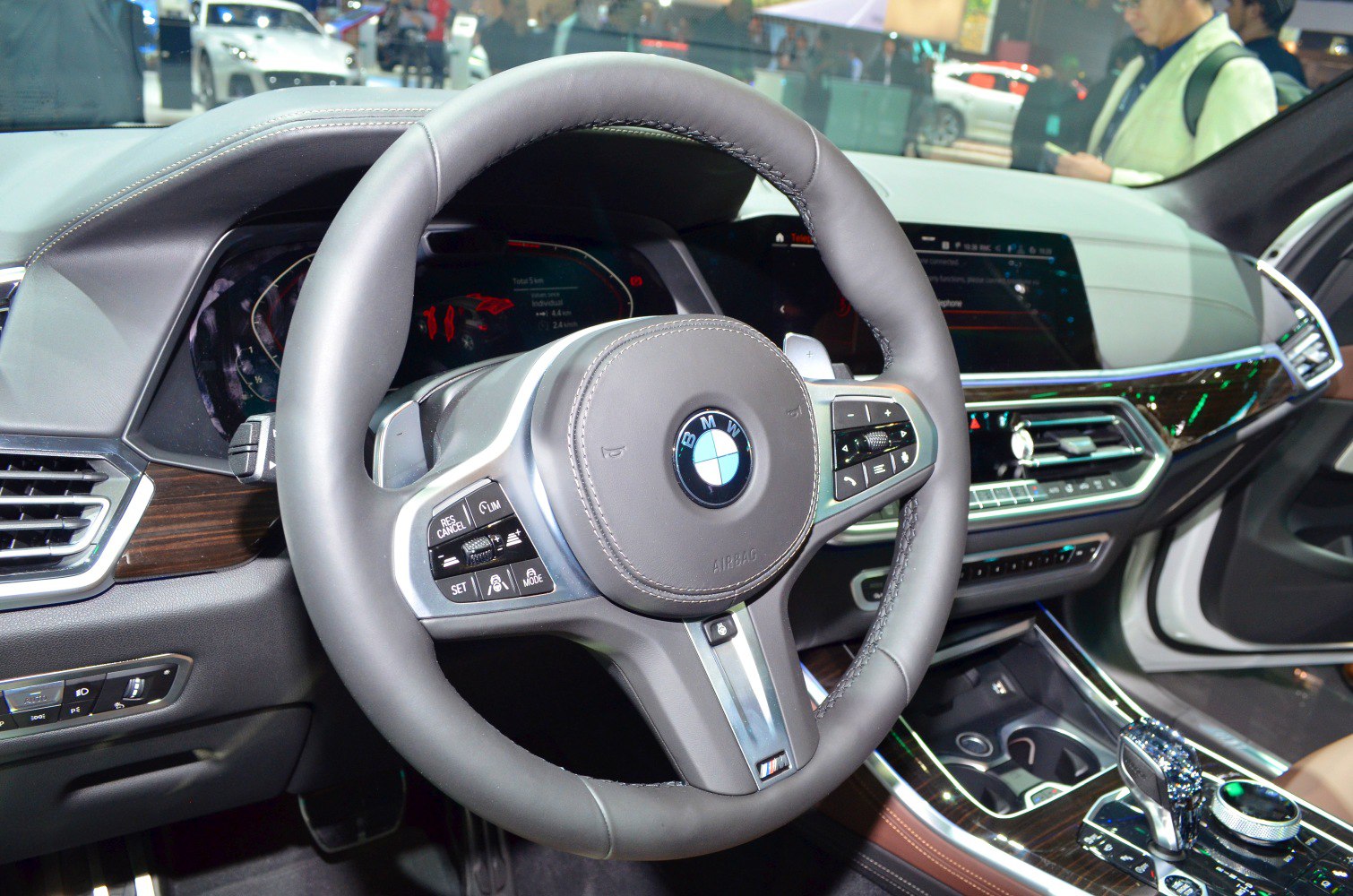 Leather-wrapped steering wheel, digital dashboard, advanced center console.