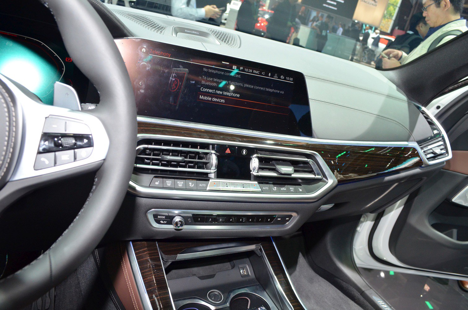 Interior dashboard with digital touchscreen and wood trim