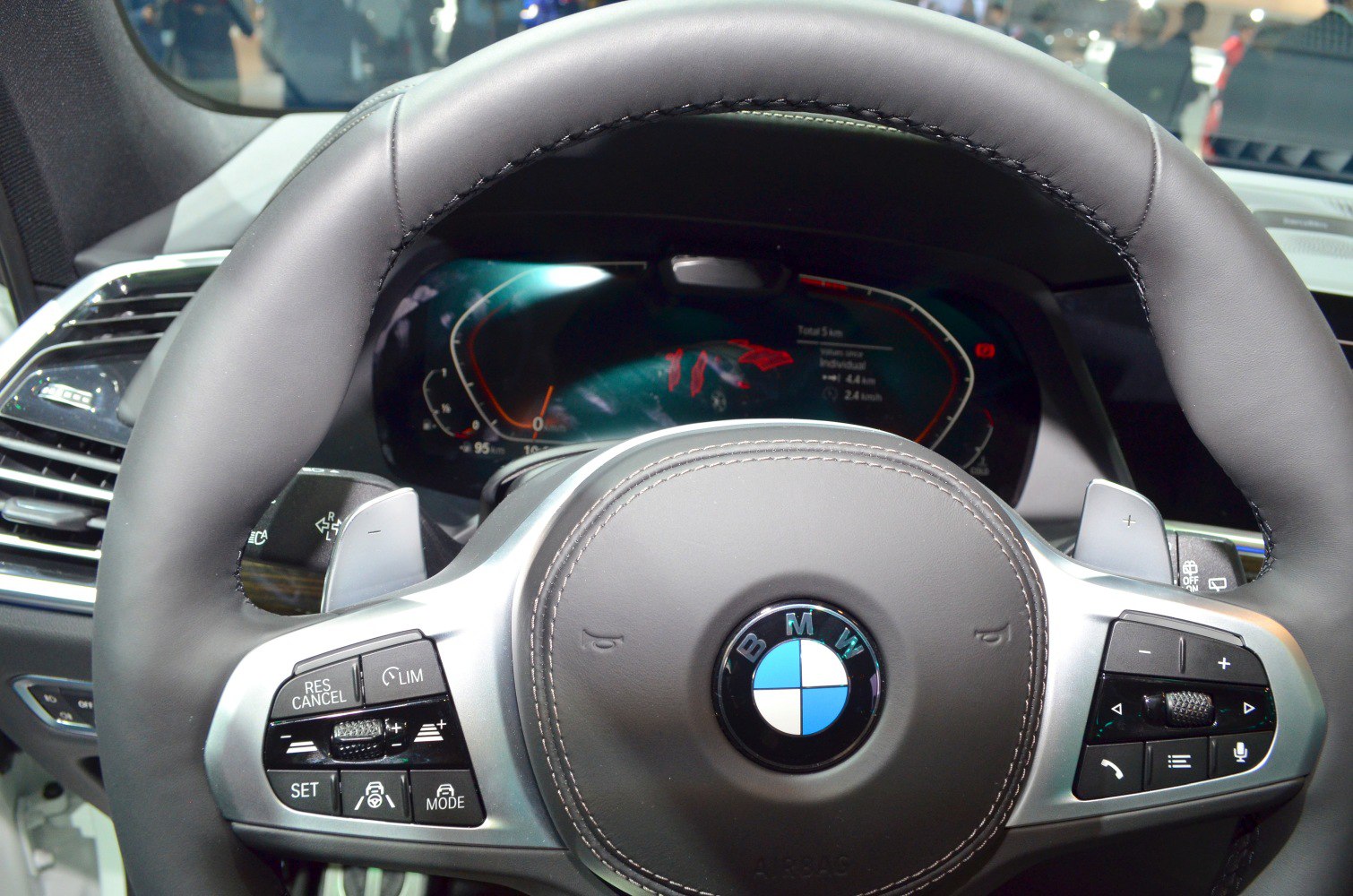 Leather steering wheel with controls and digital display cluster