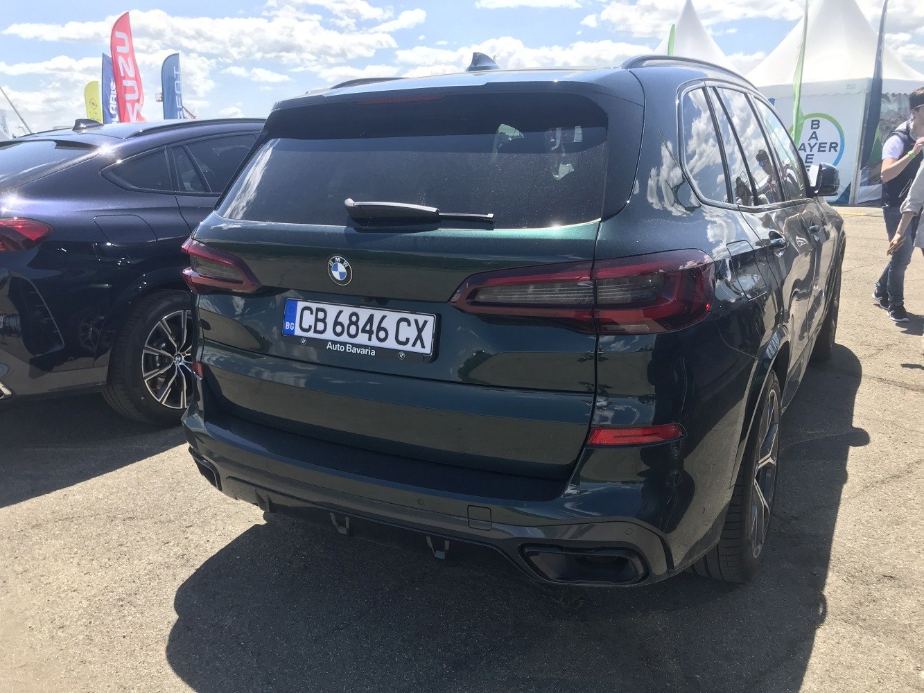 Rear view of SUV with sleek horizontal taillights and dual integrated exhaust outlets