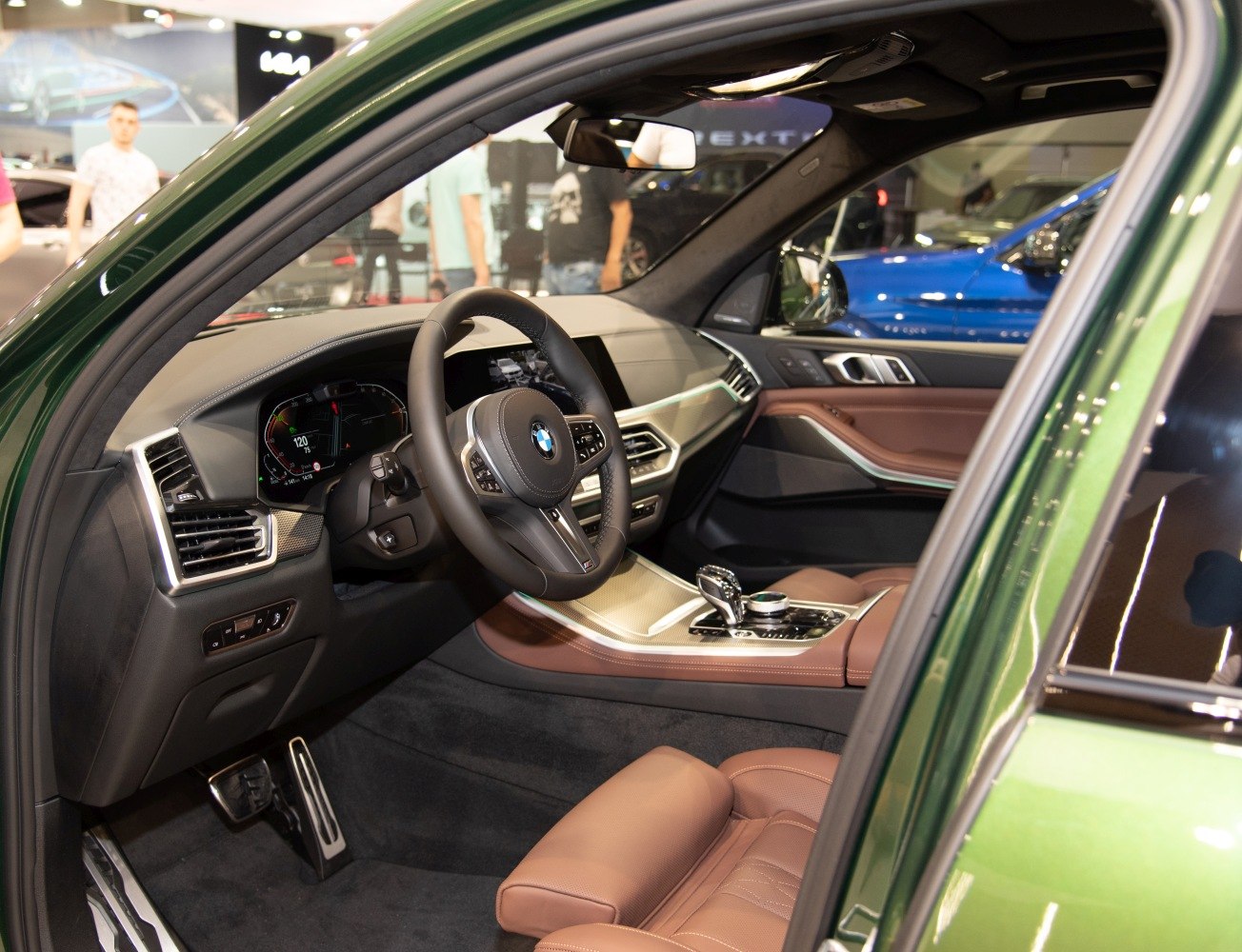 Luxury interior with brown leather seats and digital dashboard