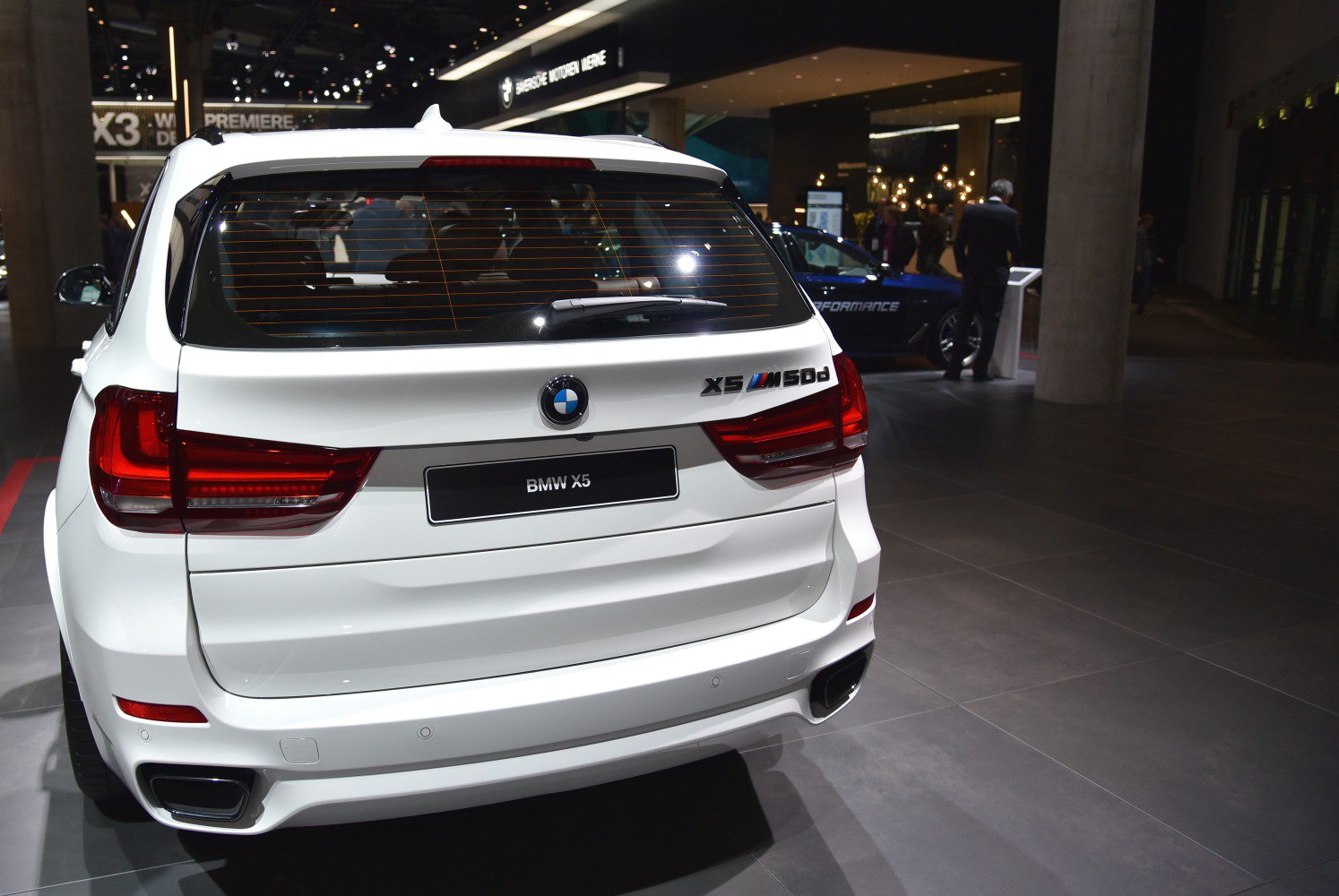 Rear view of SUV with bold taillights and model badge