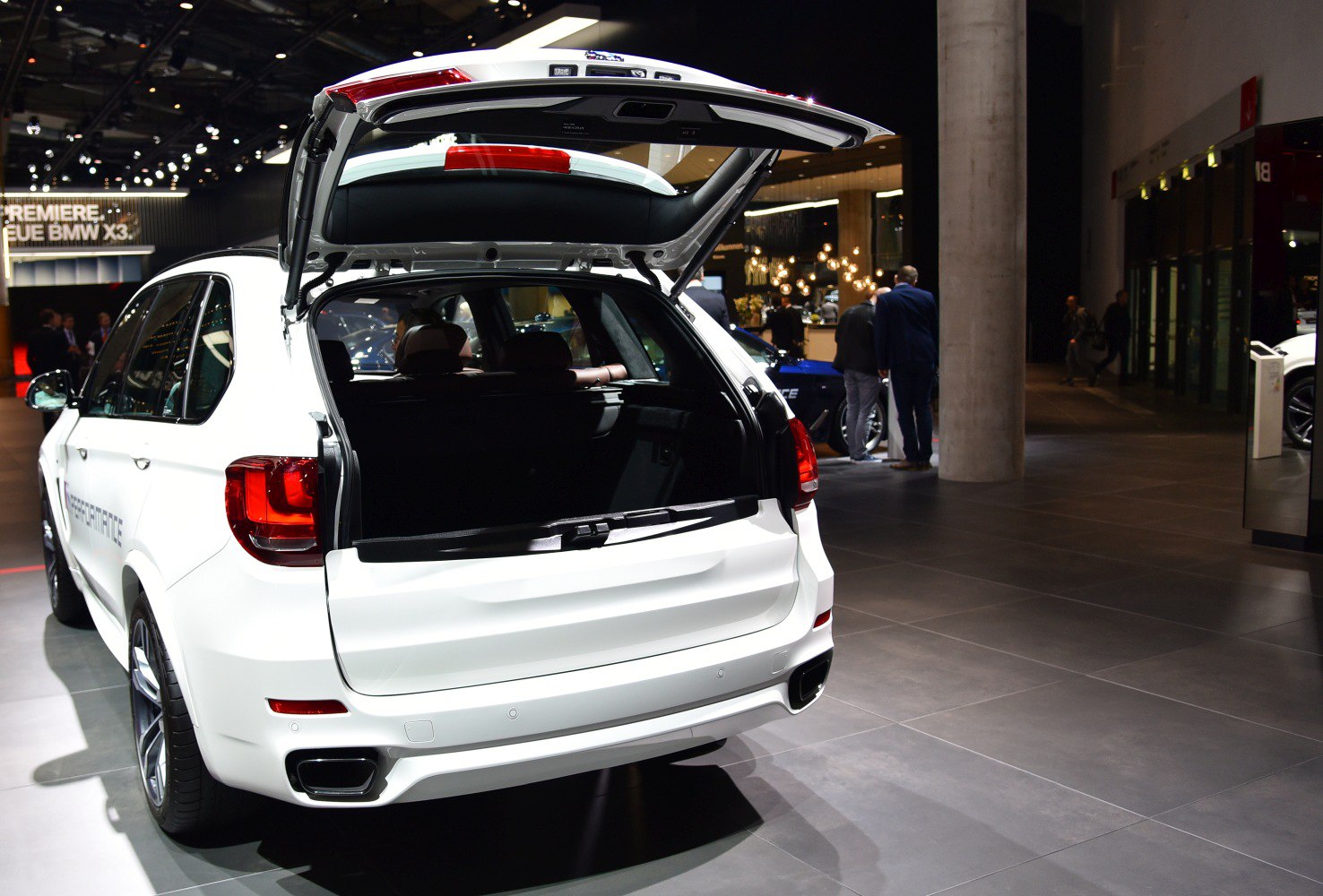 Rear view of SUV with open tailgate and visible cargo space