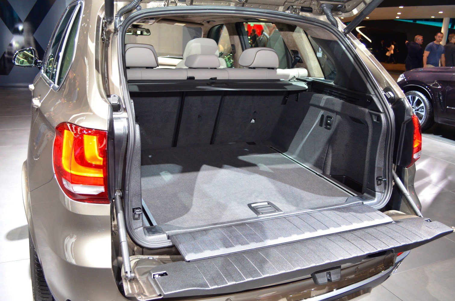 Spacious rear trunk cargo area with foldable seats and durable lining