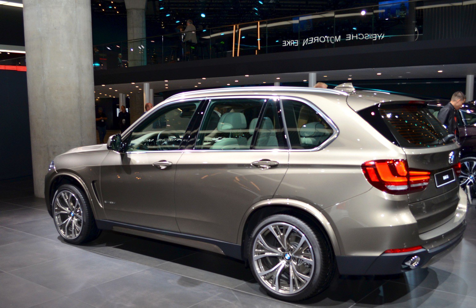 Rear side view of SUV with alloy wheels and distinct rear lights