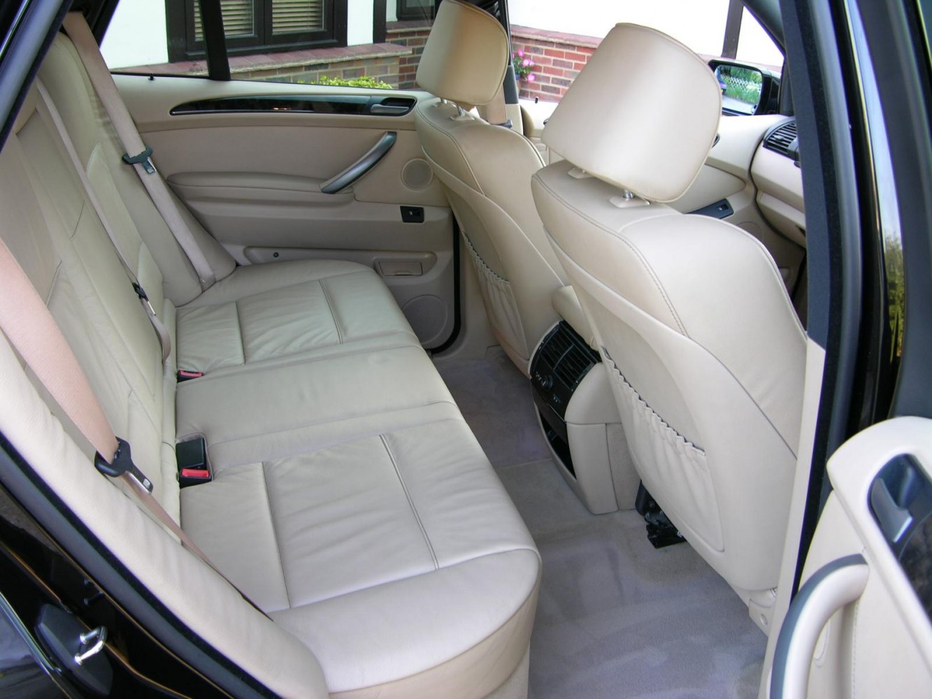 Beige leather rear seats with matching cabin interior