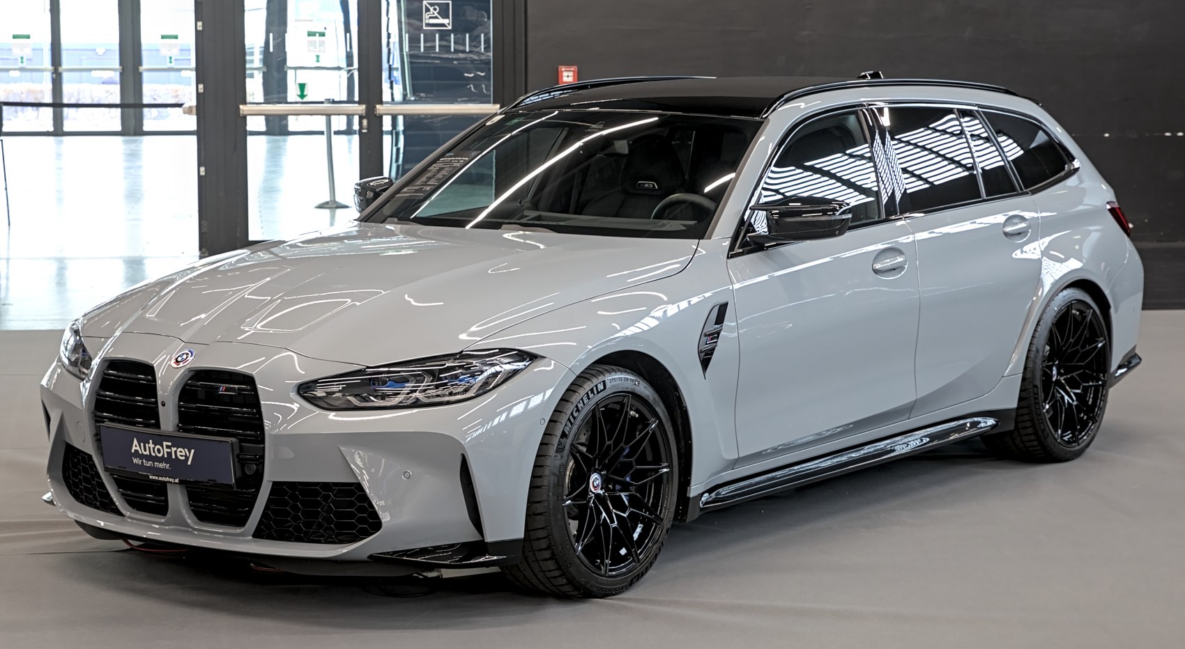 Sporty touring wagon with large kidney grille and black alloy wheels