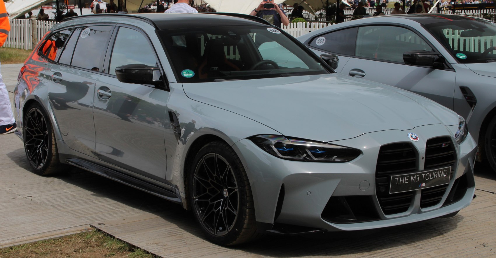 Modern sports wagon with large kidney grille and sleek LED headlights
