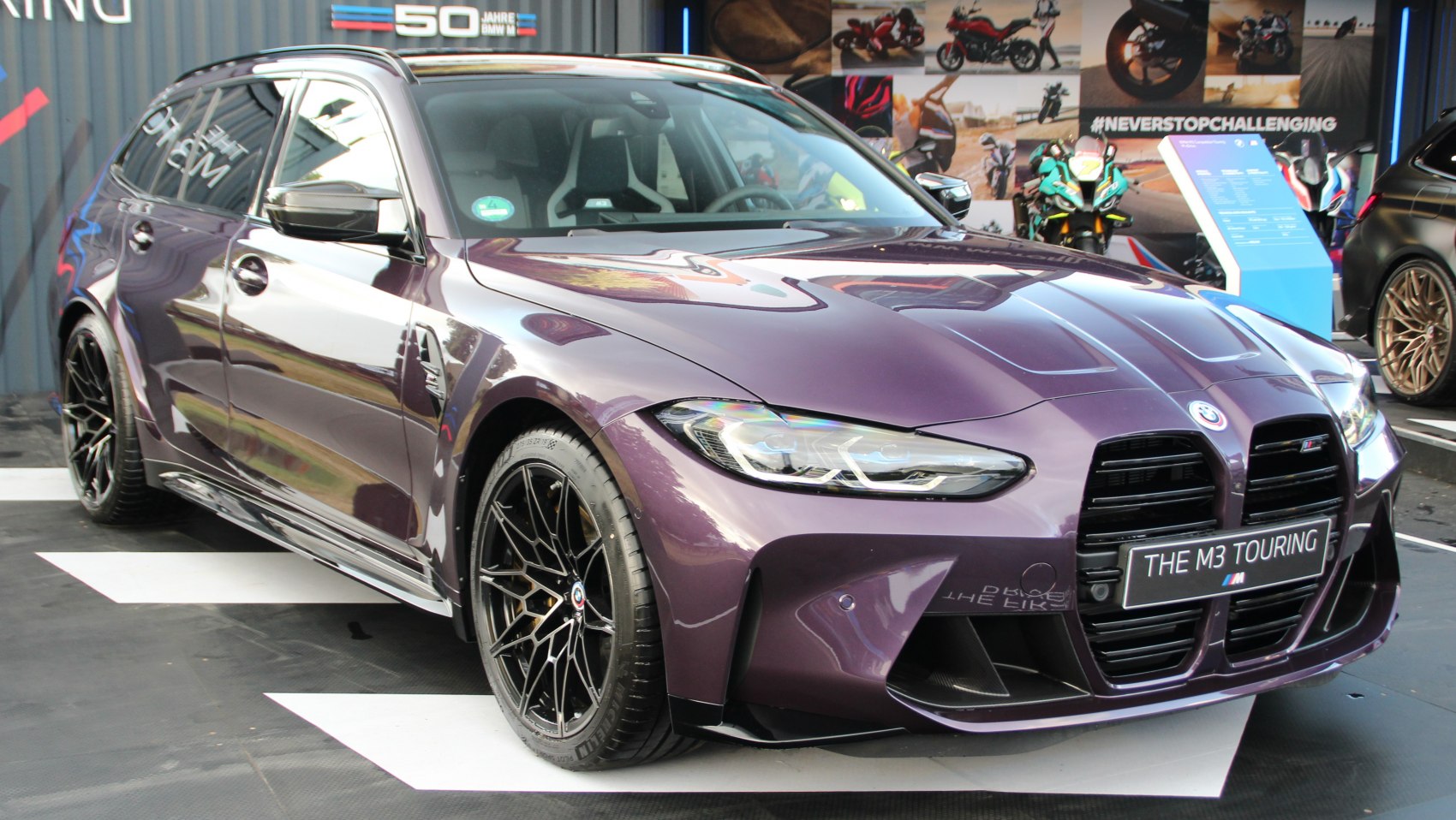 Front view with signature kidney grille and black alloy wheels